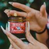 x-strength relief balm in hands